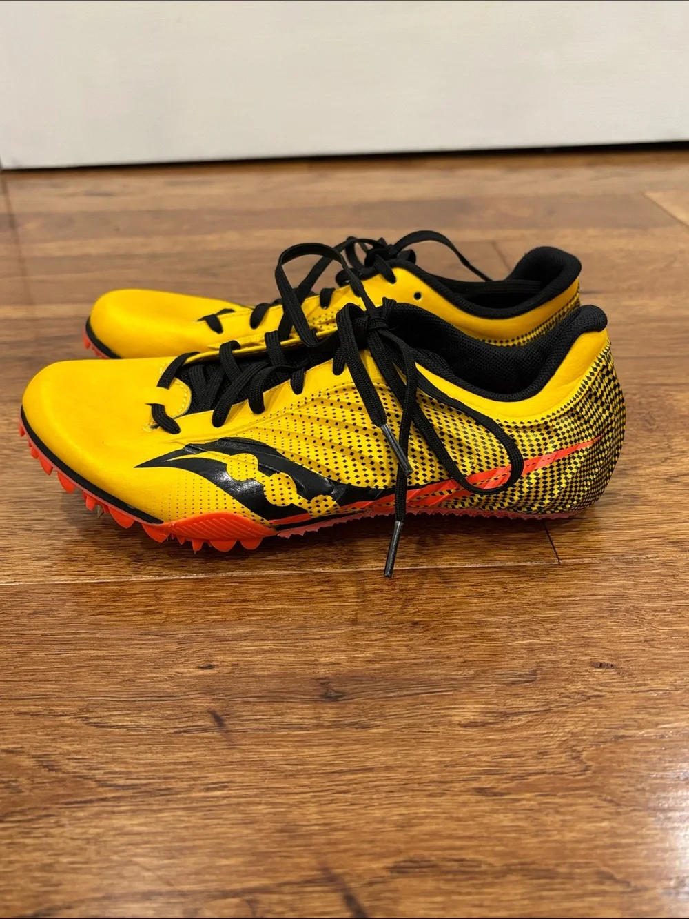 Saucony Yellow Black Sprint Spikes with Orange Sole